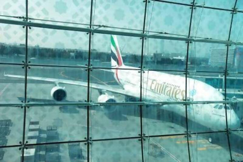 An Emirates Airline Airbus A380-800 aircraft is seen on the tarmac outside terminal 3 at concourse A, the new A380 terminal at Dubai International Airport. Gabriela Maj/Bloomberg
