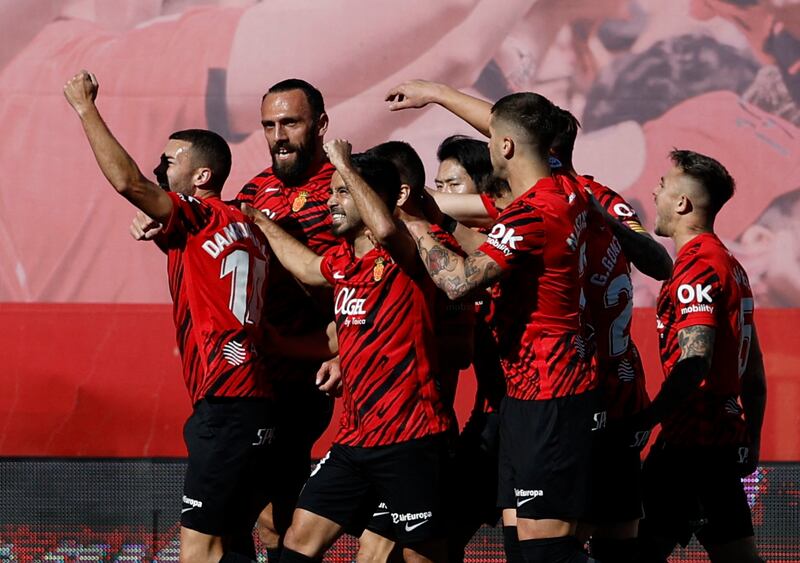 Mallorca players celebrate after scoring in the 1-0 La Liga win against Real Madrid at Mallorca Stadium on February 5, 2023. Reuters