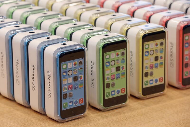 The iPhone 5C arrived on September 20, 2013 and was less expensive and very similar to the iPhone 5 except it came with colourful casing. Getty Images
