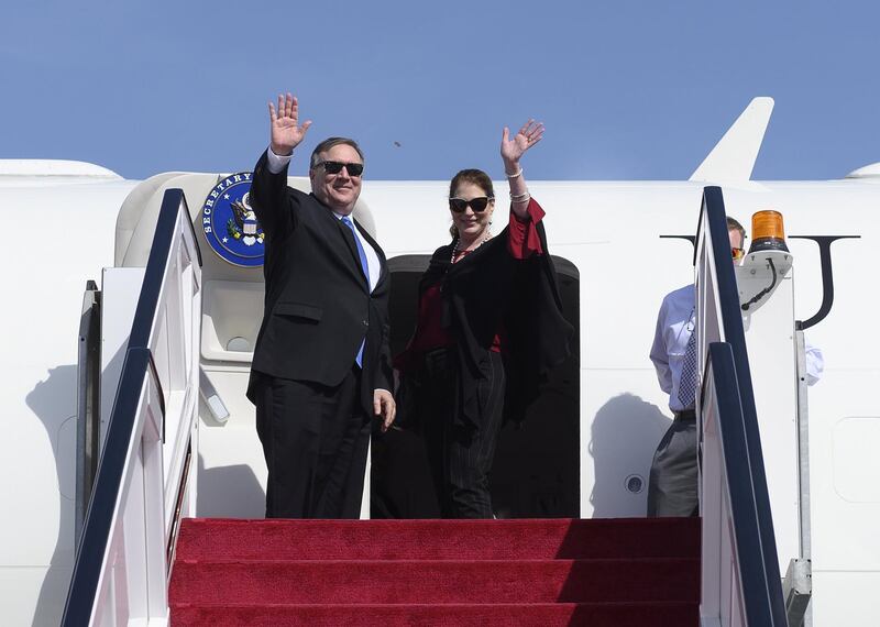 US Secretary of State Mike Pompeo and his wife Susan depart from Abu Dhabi International Airport. AFP