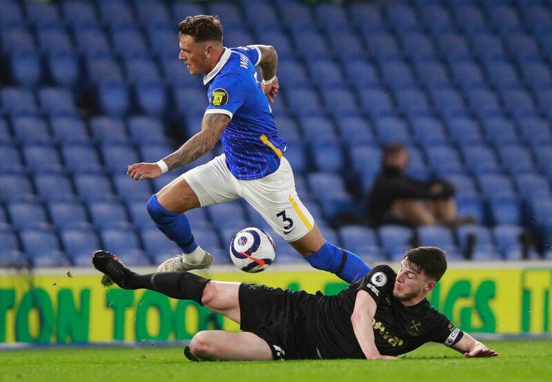 West Ham United's Declan Rice in action with Brighton's Ben White . Reuters