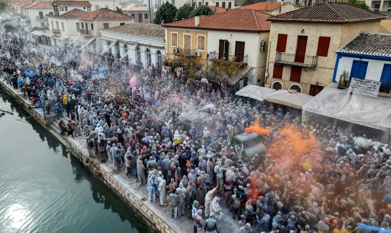 Revellers wage a colourful 'flour war' to mark the start of Lent in Galaxidi, Greece. Reuters