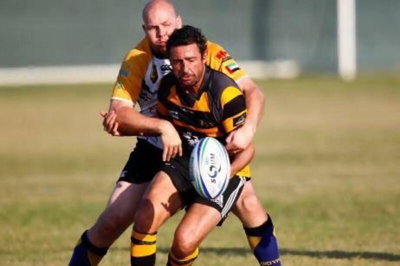 The Dubai Wasps, in yellow and black, are hoping to not be caught from behind as they sit at the top of the Gulf Conference table with a single game to play in Doha.