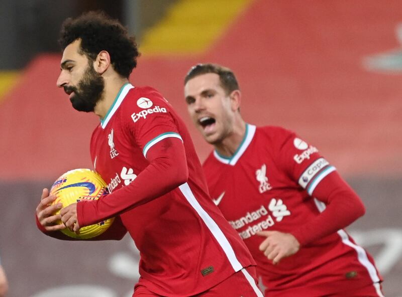 Liverpool's Mohamed Salah celebrates after scoring from the spot. Reuters
