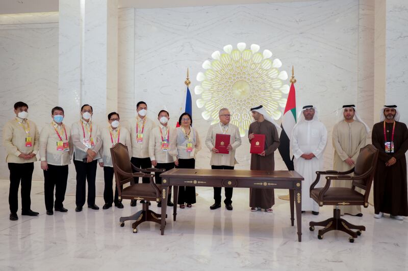 Dr Thani Al Zeyoudi, UAE Minister for Foreign Trade and Ramon Lopez, Philippines Trade and Industry Secretary, at a signing ceremony for the commencement of trade talks between the nations. Photo: Philippines pavilion at Expo 2020 Dubai