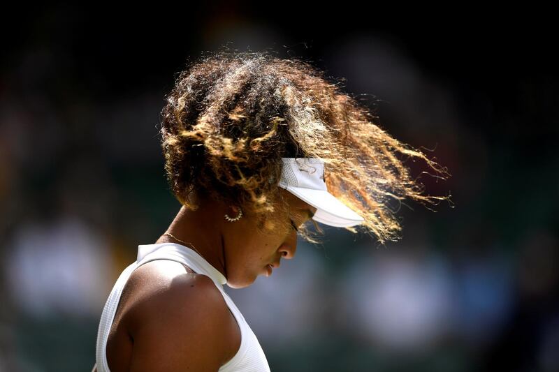 Tennis - Wimbledon - All England Lawn Tennis and Croquet Club, London, Britain - July 1, 2019  Japan's Naomi Osaka during her first round match against Kazakhstan's Yulia Putintseva   REUTERS/Tony O'Brien     TPX IMAGES OF THE DAY