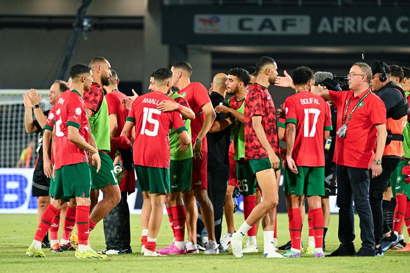 Morocco players celebrate after winning their Africa Cup of Nations match against Tanzania. AFP