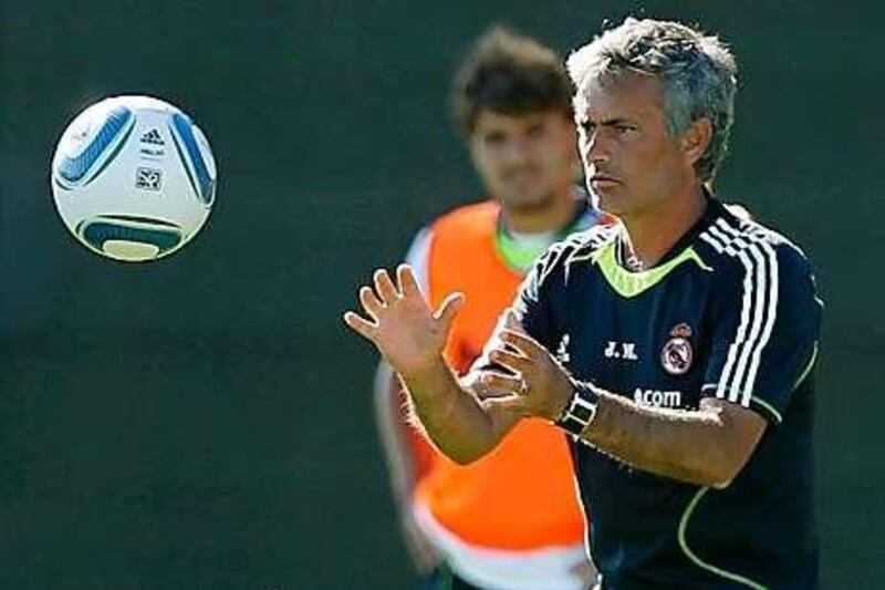 Jose Mourinho, centre, is looking to add new faces to his Real Madrid squad, preferably a defender and a striker.