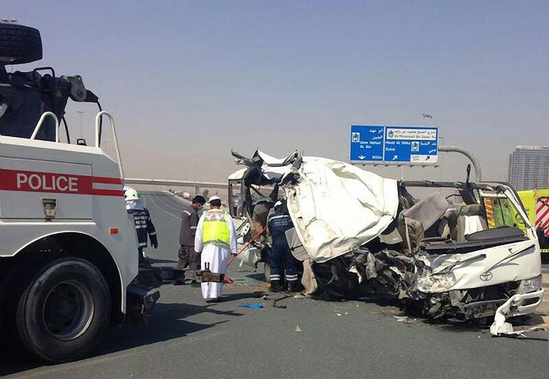 Thirteen people died and many were injured when a bus crashed into a parked lorry on the side of Emirates Road early on May 10, 2014. Courtesy Dubai Police