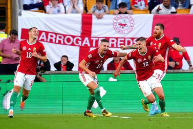 Hungary's Roland Sallai (second right) celebrates scoring their side's second goal of the game during the UEFA Nations League match at the Molineux Stadium, Wolverhampton. Picture date: Tuesday June 14, 2022.