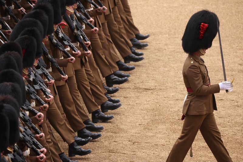 Members of the British military take part in the Brigade Major's Review at Horse Guards Parade in London. Getty