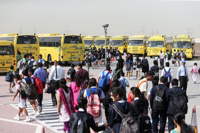 DUBAI, UAE. February 17, 2015 - Stock photograph of students boarding their school buses after school at Gems Modern Academy in Dubai, February 17, 2015. (Photos by: Sarah Dea/The National, Story by: Roberta Pennington, News)
 *** Local Caption ***  SDEA170215-gemsmodernacademy25.JPG