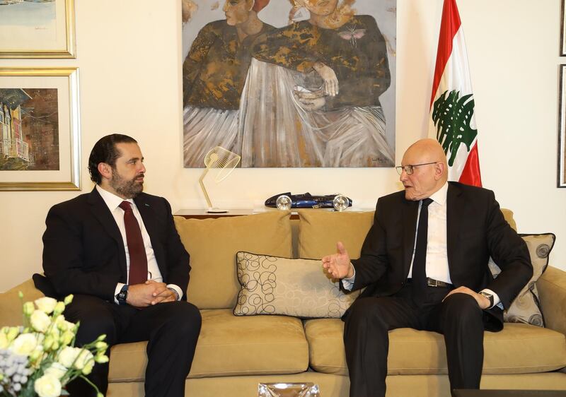 A photo distributed by the official Lebanese photography agency shows prime minister-designate Saad Hariri meeting with former prime minister Tammam Salam as discussions begin on the formation of the next cabinet, May 28, 2018. (Dalati Nohra / EPA)