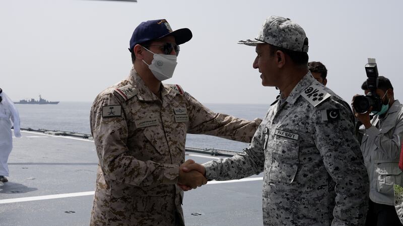 Saudi Arabia's Gen Admiral Fahad bin Abdullah Al Ghofaily and Pakistan's Admiral Amjad Khan Niazi meet at the start of the exercise.