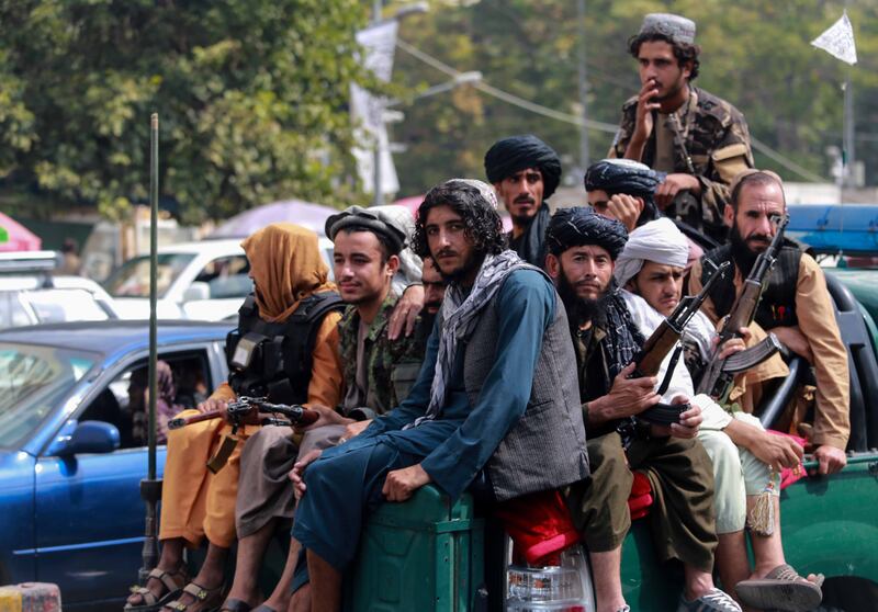 Taliban patrol Kabul. EPA