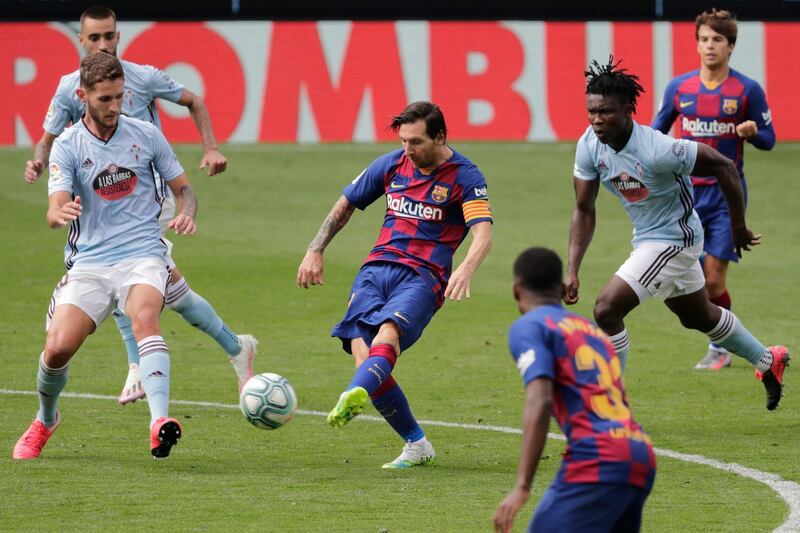 Barcelona's Lionel Messi passes the ball. AP