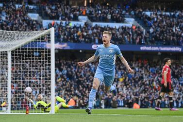 MANCHESTER, ENGLAND - MARCH 06: Kevin De Bruyne of Manchester City celebrates after scoring their sides first goal during the Premier League match between Manchester City and Manchester United at Etihad Stadium on March 06, 2022 in Manchester, England. (Photo by Michael Regan / Getty Images)