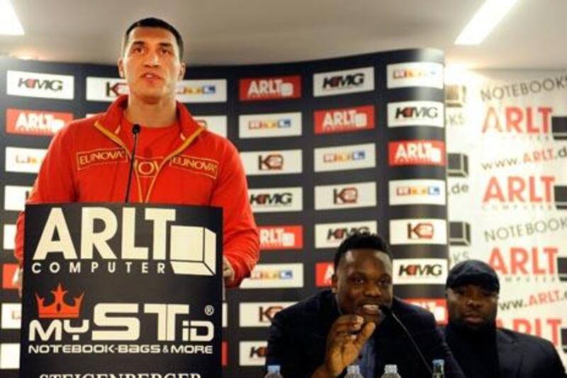 MANNHEIM, GERMANY - DECEMBER 06:  Ukrainian world heavyweight champion Wladimir Klitschko (L) and his challenger Dereck Chisora (R) of Great Britain talk during a press conference at the hotel Steigenberger Hof on December 6, 2010 in Mannheim, Germany. Klitschko will defend his IBF, WBO and IBO heavyweight titles against Derek Chisora of England.  (Photo by Thorsten Wagner/Bongarts/Getty Images)