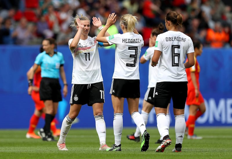 RENNES, FRANCE - JUNE 08: Alexandra Popp of Germany celebrates with Kathrin Hendrich and Lena Oberdorf following the 2019 FIFA Women's World Cup France group B match between Germany and China PR at Roazhon Park on June 08, 2019 in Rennes, France. (Photo by Maja Hitij/Getty Images)