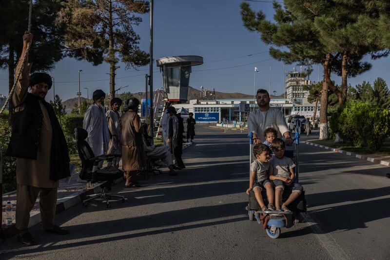 Passengers leaving Kabul airport. Stefanie Glinski for The National