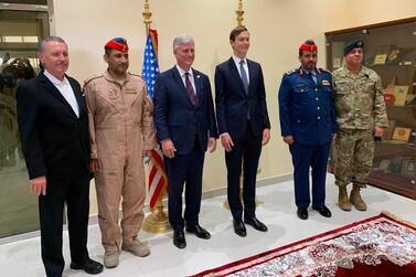 Senior White House adviser Jared Kushner, centre right, and the US National Security Adviser Robert O’Brien, centre left, pose for a photo with Emirati military officials during a visit to the Al Dhafra base, on the outskirts of Abu Dhabi on September 1, 2020.  AFP