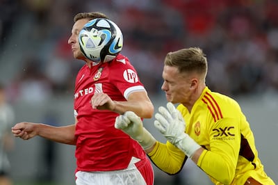 Paul Mullin of Wrexham collides with Manchester United goalkeeper Nathan Bishop during the first half of a pre-season friendly match at Snapdragon Stadium on July 25, 2023 in San Diego, California. AFP