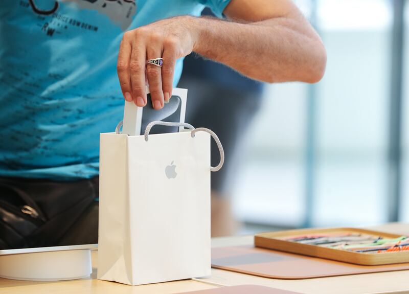 The new iPhone 15 is popped into a bag
