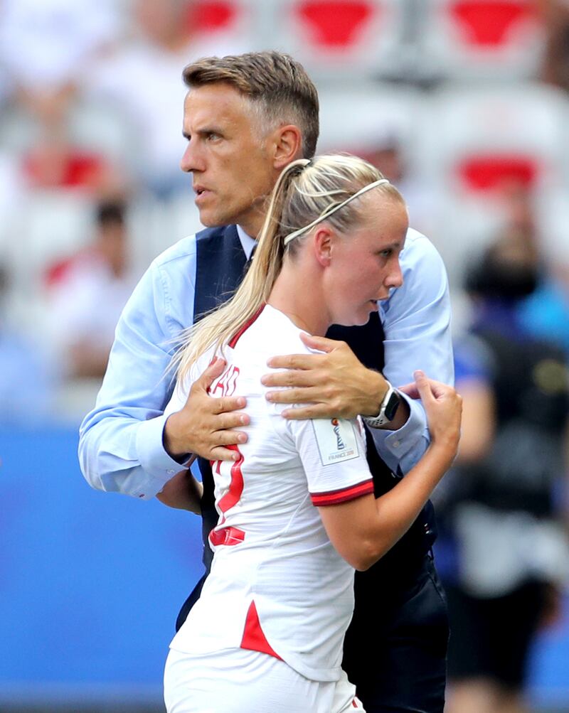 Phil Neville with Beth Mead after the 2019 World Cup third-place play-off defeat against Sweden. PA