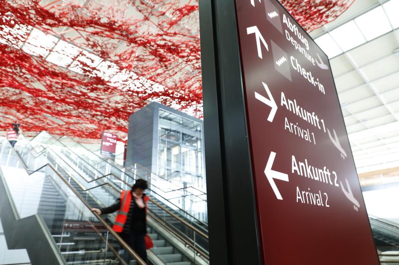 SCHOENEFELD, GERMANY - MAY 08: Employees work at the unfinished BER Willy Brandt Berlin Brandenburg International Airport on May 8, 2019 in Schoenefeld, Germany. A recent report documents over 11,000 construction defects at the airport, which has been under construction since 2006. Originally scheduled to open in 2011, final completion of the new airport has been fraught with technical delays, construction design shortcomings, corruption scandals and other impediments.  (Photo by Michele Tantussi/Getty Images)