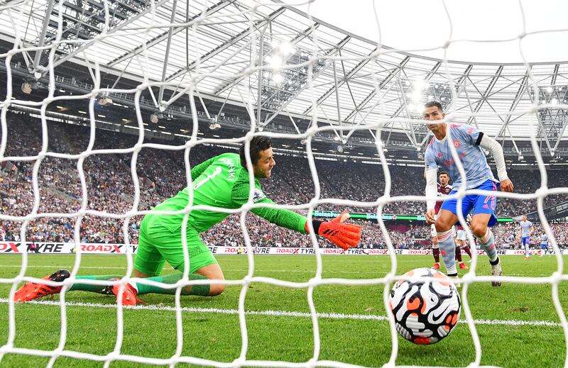 Manchester United Cristiano Ronaldo scores against West Ham United during the Premier League match at the London Stadium in September, 2021. Getty