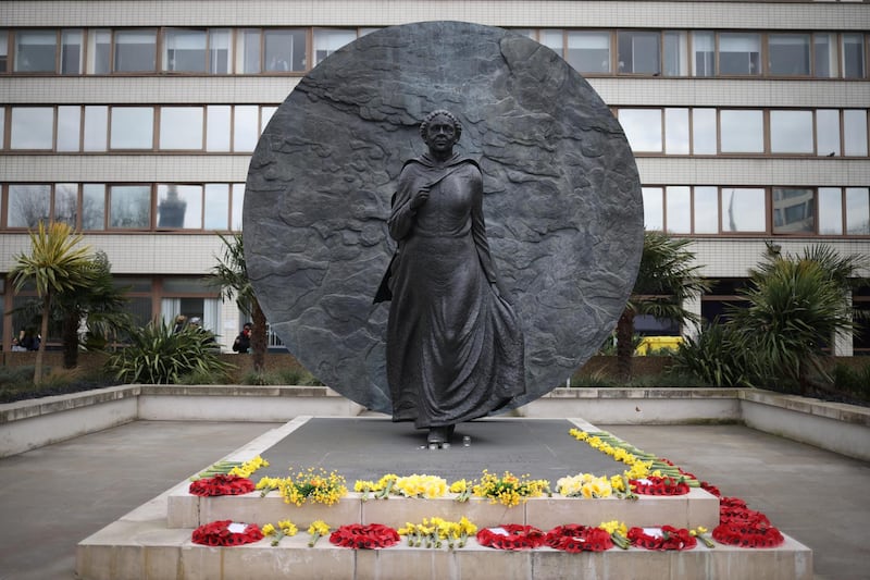 Flowers are seen at the Mary Seacole statue in the garden of St Thomas' Hospital in London. Reuters