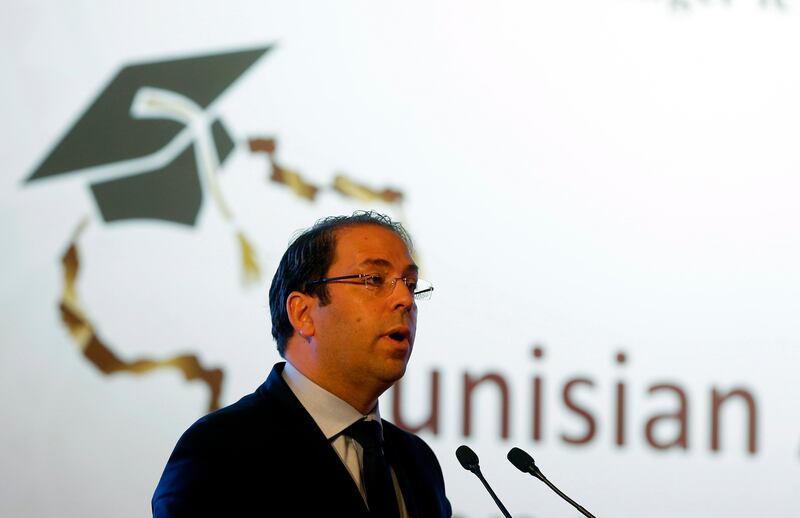 epa06156035 Tunisian Prime Minister Youssef Chahed  speaks during the opening of Tunisian African Empowerment Forum in Tunis, Tunisia, 22 August 2017. Tunisian African Empowerment Forum aims to revive Tunisia as a destination of choice for Africans in the field of higher education and vocational training, and consolidating the efforts of government, civil society, universities, and training centers to reach this goal.  EPA/MOHAMED MESSARA