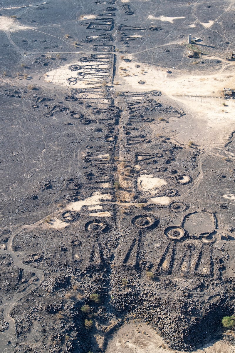 A funerary avenue flanked by Bronze Age tombs, leading out of Al Ayn Oasis near Khaybar in north-west Saudi Arabia. Photo: Royal Commission for AlUla