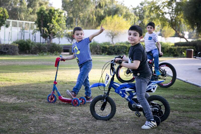 ABU DHABI, UNITED ARAB EMIRATES - JANUARY 16, 2019.

Malik Al Jasser, left, with his brothers, Hayel and Milad in Heritage park on Abu Dhabi's corniche.

(Photo by Reem Mohammed/The National)

Reporter: Shireena
Section:  NA