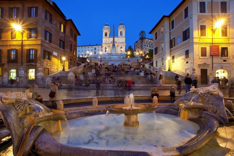 The Piazza di Spagna (Spain Square) shopping district and the Trinita dei Monti Church in the background, in Rome. Sylvain Sonnet /Corbis