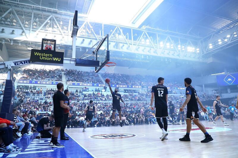 The roof opens at Melbourne Arena as players warm-up ahead of the NBL match between Melbourne United and Cairns Taipans on Thursday, December 26. Getty.