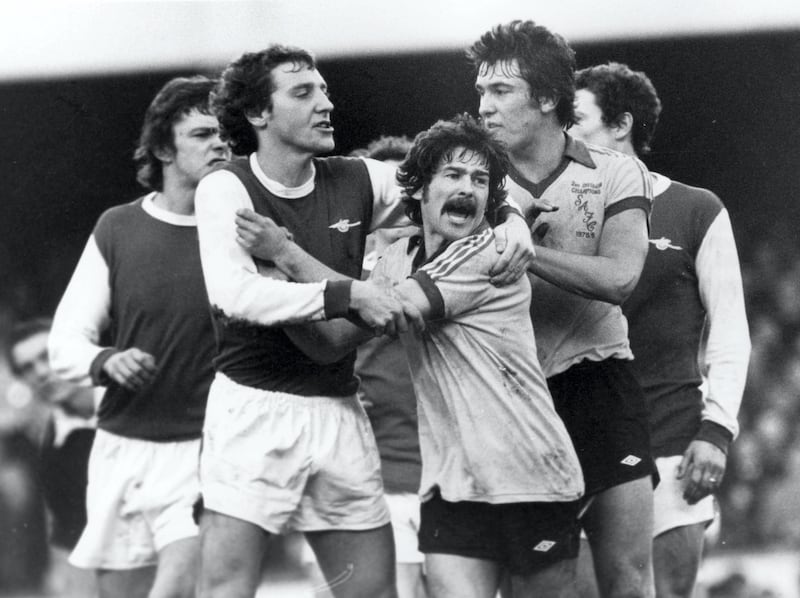 Arsenal's Sammy Nelson, holds back Bobby Kerr of Sunderland (centre) to prevent him clashing with Gunners Wilf Rostron. Rostron has just punched Bobby Kerr in the face, also pictured Bob Lee, Sunderland's Â£200,000 buy from Leicester City on right. Final score: Arsenal 0-0 Sunderland (Photo by MSI/Mirrorpix/Mirrorpix via Getty Images)