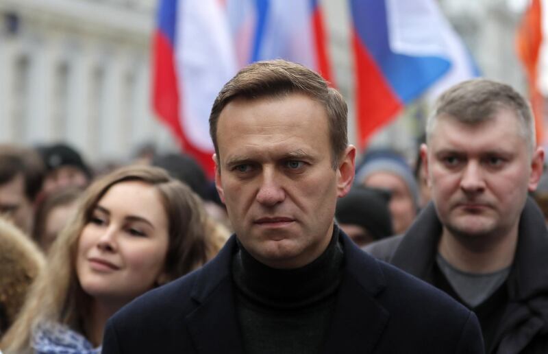 epa08667732 (FILE) - Russian opposition leader and anti-corruption activist Alexei Navalny (C) takes part in a memorial march for Boris Nemtsov marking the fifth anniversary of his assassination in Moscow, Russia, 29 February 2020 (reissued 14 September 2020). The German government spokesperson on 14 September 2020 said laboratories in France and Sweden have confirmed that Navalny was poisoned with a nerve agent from the Novichok group. Navalny is treated at the Charite hospital in Berlin since 22 August 2020. He was first placed in an hospital in Omsk, Russia, after he felt bad on board of a plane on his way from Tomsk to Moscow. The flight was interrupted and after landing in Omsk Navalny was delivered to hospital with a suspicion on a toxic poisoning.  EPA/YURI KOCHETKOV  EPA-EFE/YURI KOCHETKOV