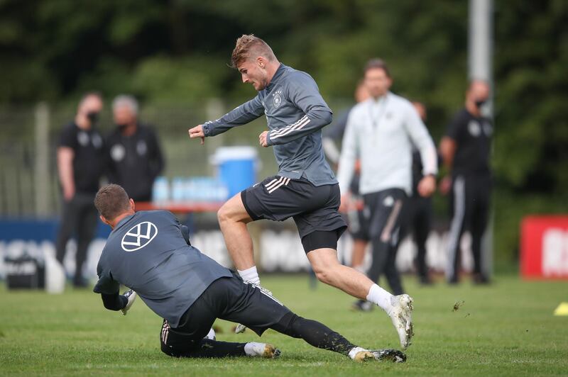 Timo Werner challenges Kevin Trapp during a training session at ADM-Sportpark ahead of Germany's Uefa Nations League group stage match against Spain. Getty Images