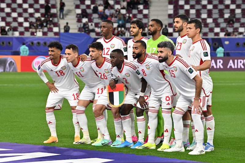 UAE's players pose for a group photograph. AFP