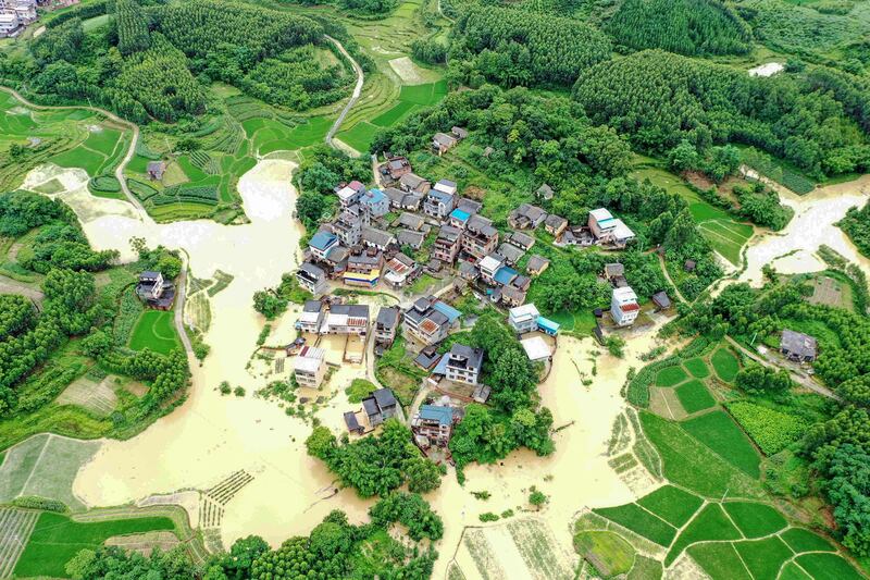 Heavy rain floods fields and buildings in Rongan in China's southern Guangxi region. AFP