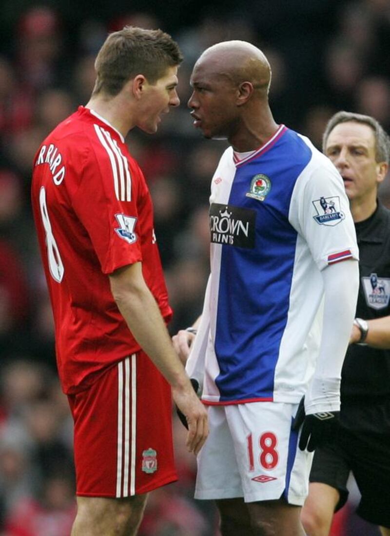 Liverpool's Steven Gerrard, left, faces up to Blackburn Rovers' El-Hadji Diouf. AP Photo