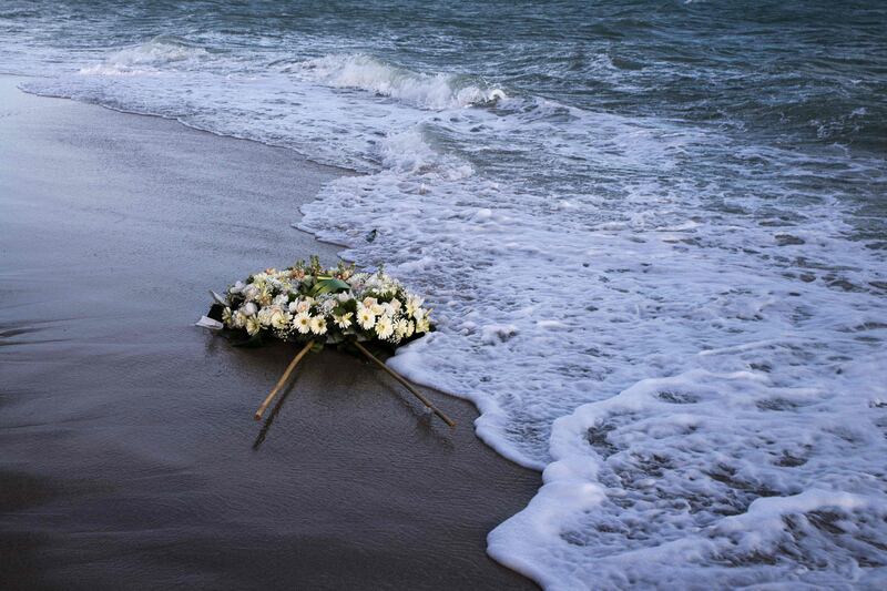 A wreath floats on the Mediterranean Sea after a shipwreck on March 11, 2023, in Steccato di Cutro, in Calabria in southern Italy, claimed 74 lives, including those of children. AFP