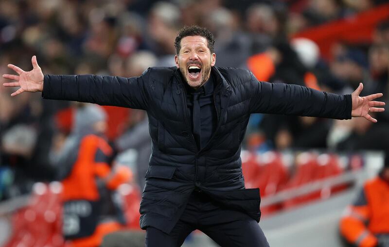 LIVERPOOL, ENGLAND - MARCH 11:  Diego Simeone, Manager of Atletico Madrid celebrates his sides second goal during the UEFA Champions League round of 16 second leg match between Liverpool FC and Atletico Madrid at Anfield on March 11, 2020 in Liverpool, United Kingdom. (Photo by Julian Finney/Getty Images)