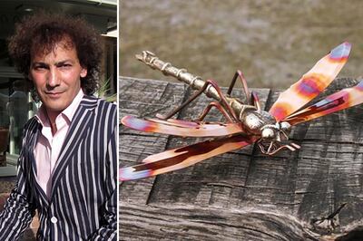 Mehrdad Tafreshi and a brass dragonfly created by him. Photo: Quist