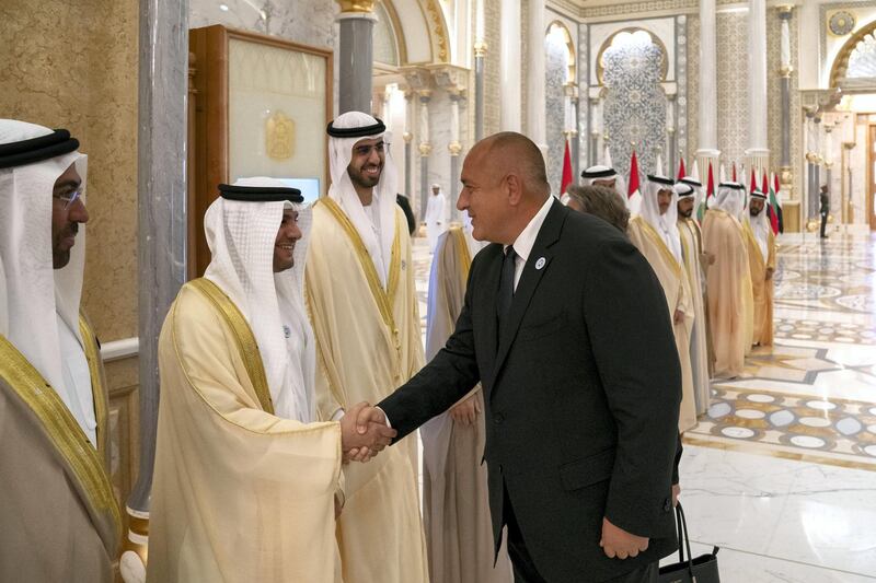 ABU DHABI, UNITED ARAB EMIRATES - October 21, 2018: HE Dr Ahmed Mubarak Al Mazrouei, Secretary General of the Abu Dhabi Executive Council (2nd L), greets HE Boyko Borissov, Prime Minister of Bulgaria (R), during a reception at the Presidential Palace. Seen with HE Ahmed bin Al Sayegh, UAE Minister of State (L) and HE Omar bin Sultan Al Olama, UAE Minister of State for Artificial Intelligence (3rd L).

( Hamad Al Kaabi / Crown Prince Court - Abu Dhabi )
---