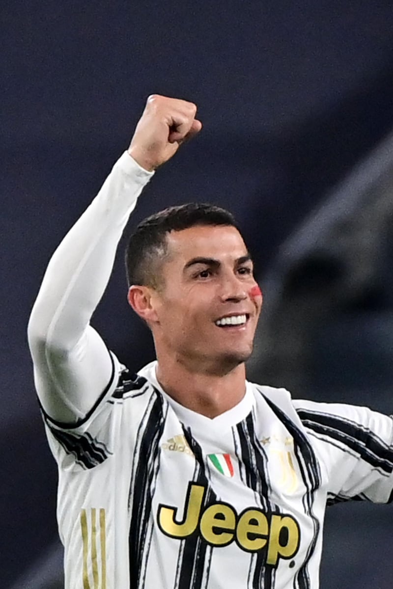 Cristiano Ronaldo celebrates after opening the scoring for Juventus against Cagliari. AFP