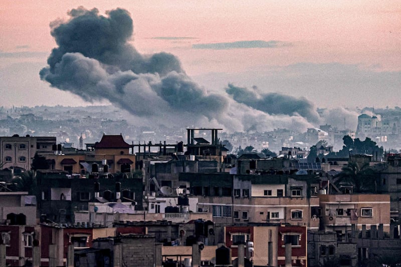 Smoke rises over Khan Younis in the southern Gaza Strip, as seen from Rafah, during sustained Israeli air strikes. AFP