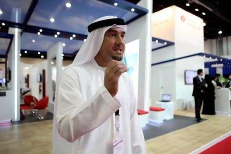 Abdulrahman Sami Saqr, Senior Vice President of Human Resources at First Gulf Bank, at Tawdheef Employment Fair 2013 to meet qualified Emiratis looking for jobs. Fatima AL Marzooqi / The National