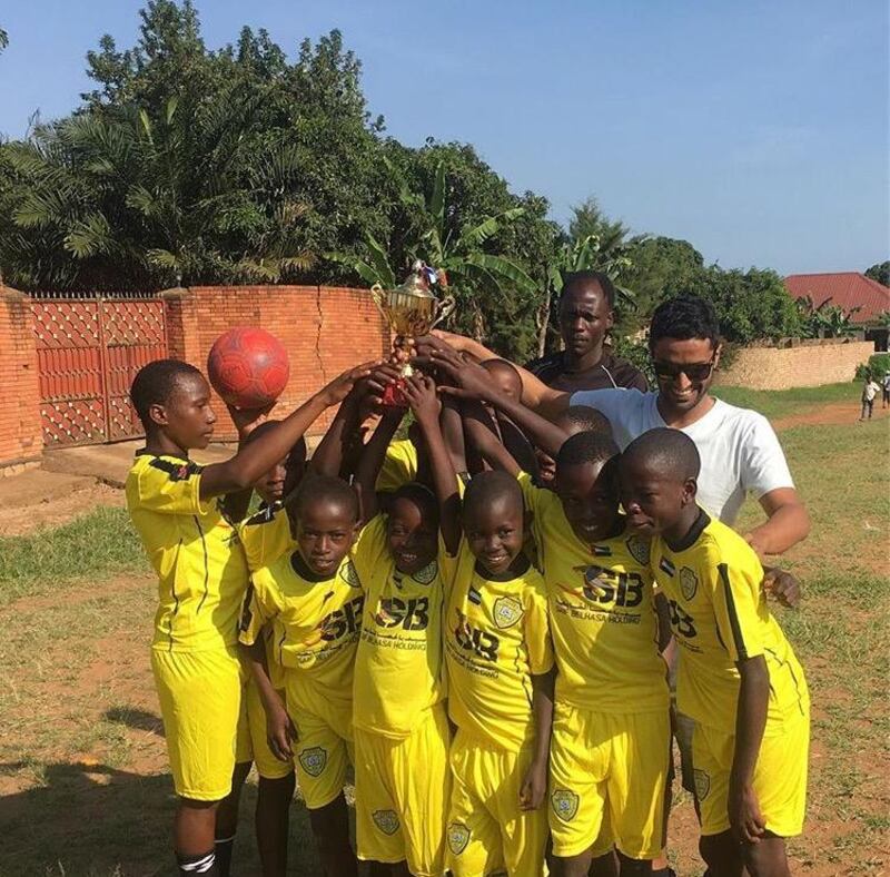 Salem Alkarbi hosts events for disadvantaged children worldwide through his football charity "Beyond the Boundaries of Football". Here he is in Uganda. Courtesy Salem Alkarbi